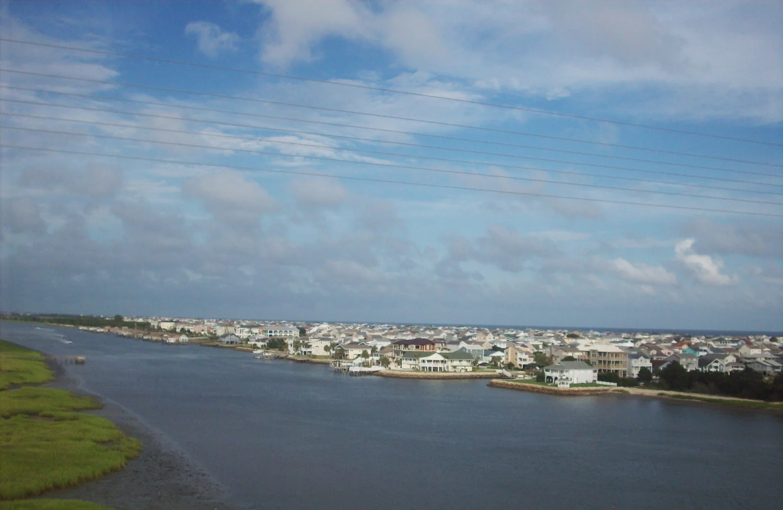Ocean Isle Beach houses and waterways viewed from the bridge in Justin Champion's July 2008 photograph.